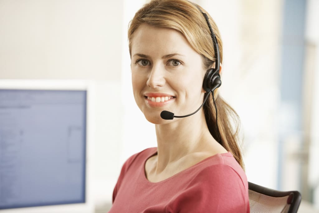 Office Worker Wearing a Telephone Headset